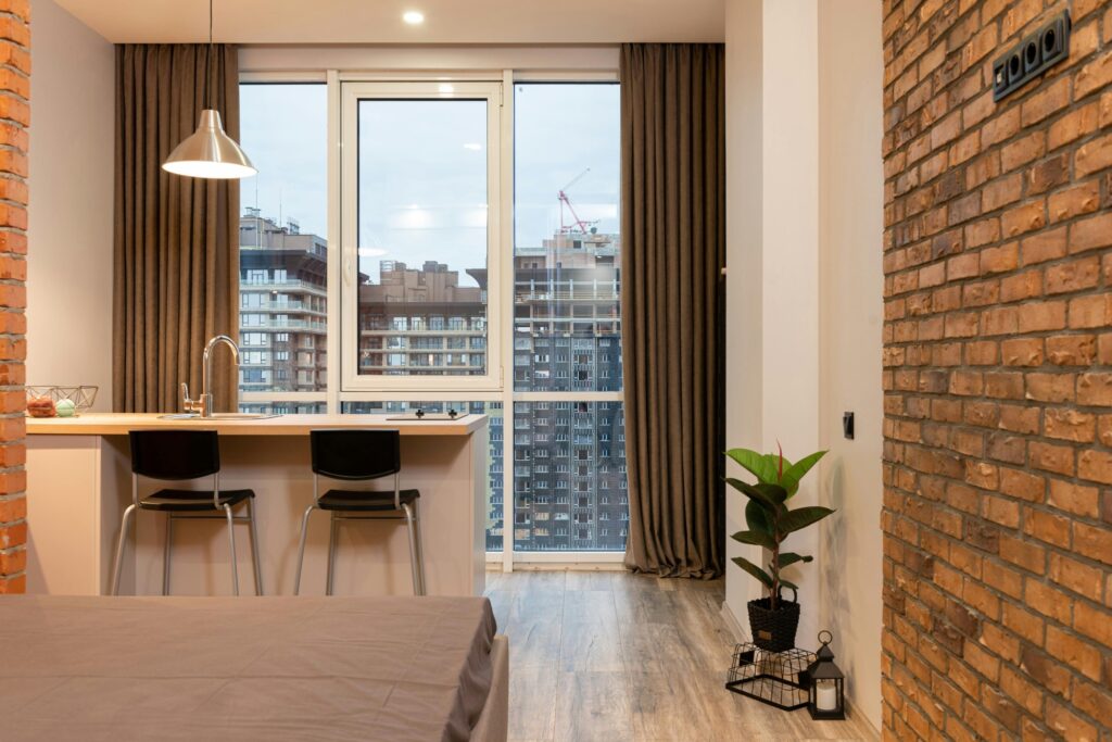 A studio flat with a view of the nearby apartment buildings