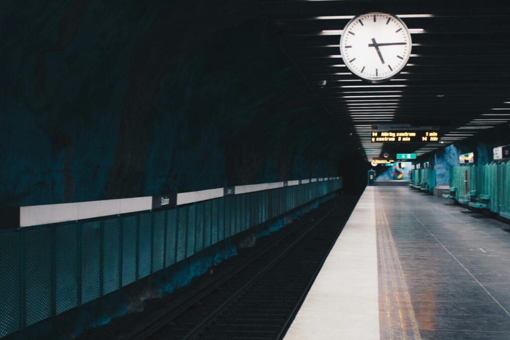 An empty train station with a huge clock
