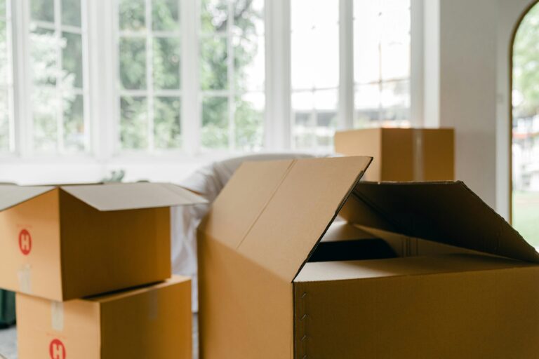 Empty cardboard boxes for packing things in the living room