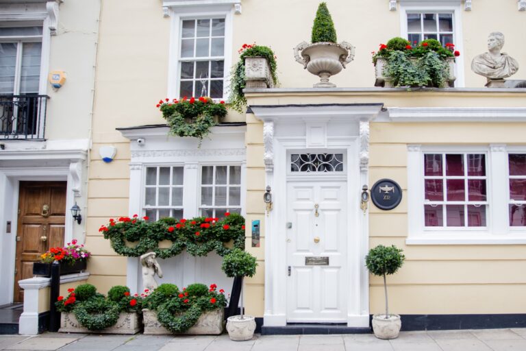 Front side of two houses in the concept of affordable housing options in Chiswick.