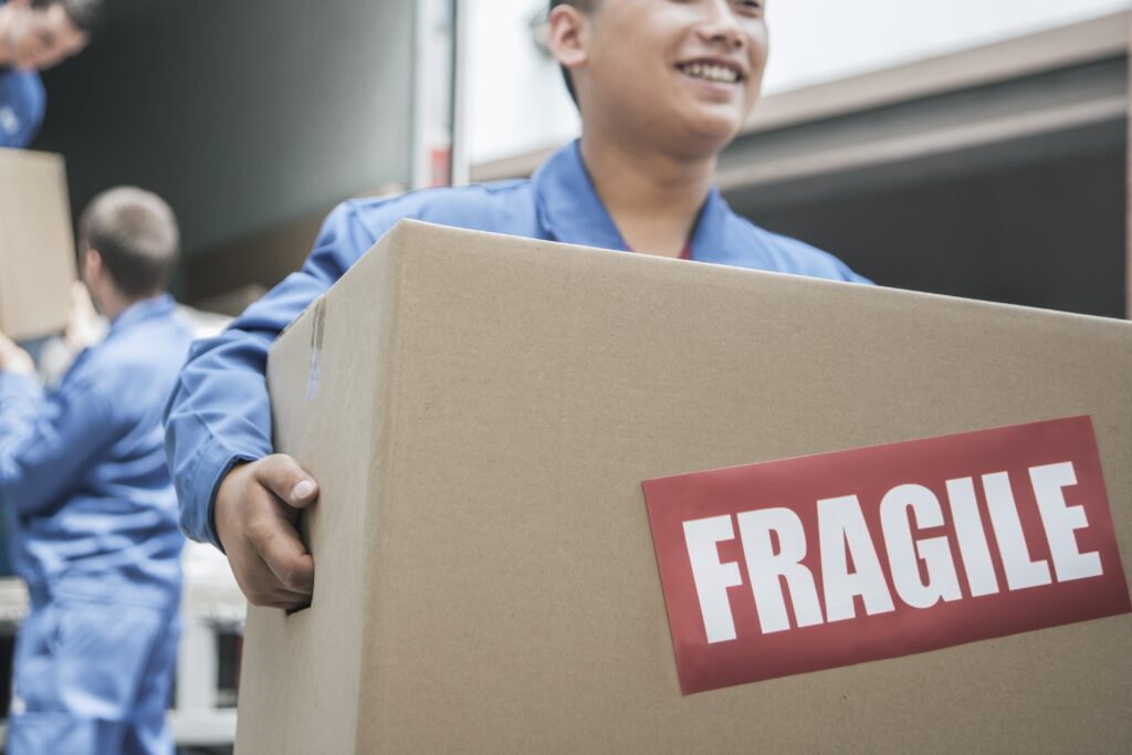 Movers unloading the removals truck